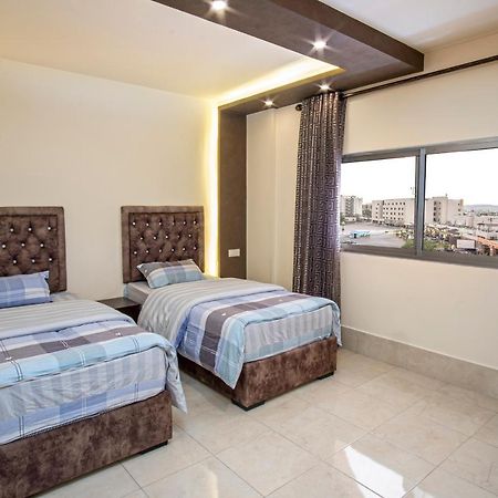 Al Riyati Hotel Apartments Aqaba Bagian luar foto