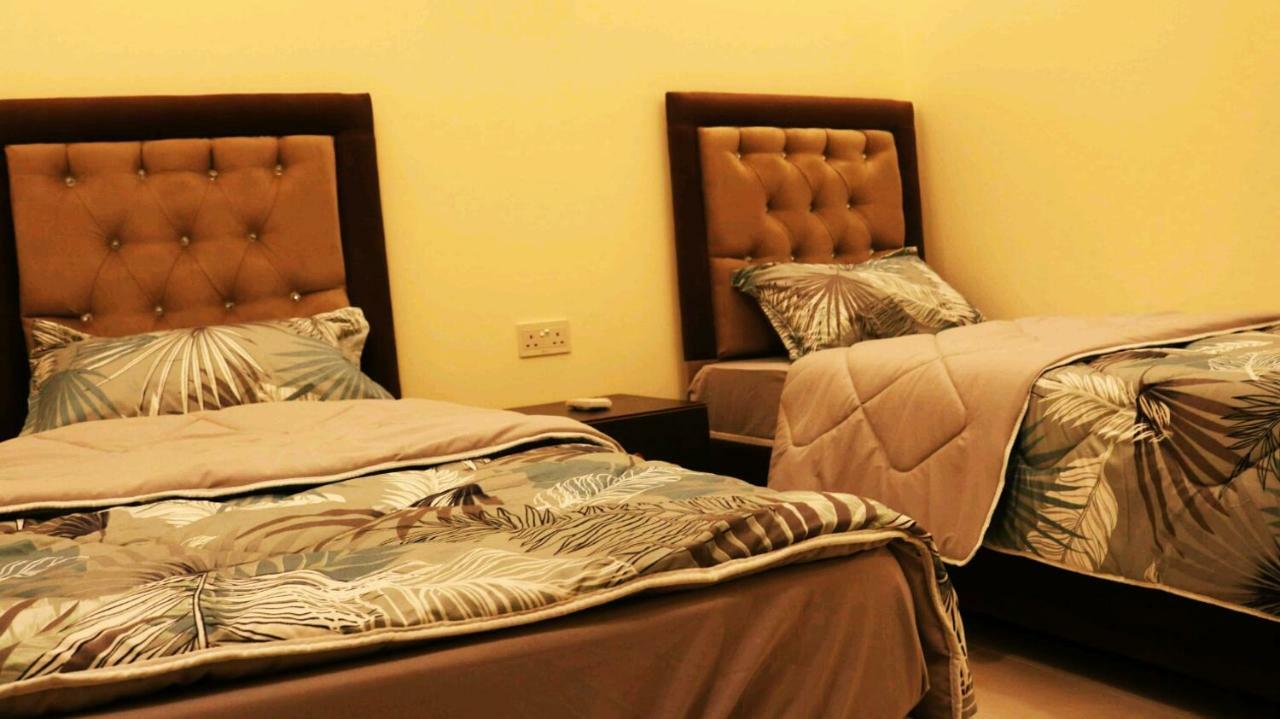 Al Riyati Hotel Apartments Aqaba Bagian luar foto